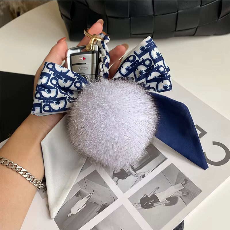 BOWED POMPOM CHARM