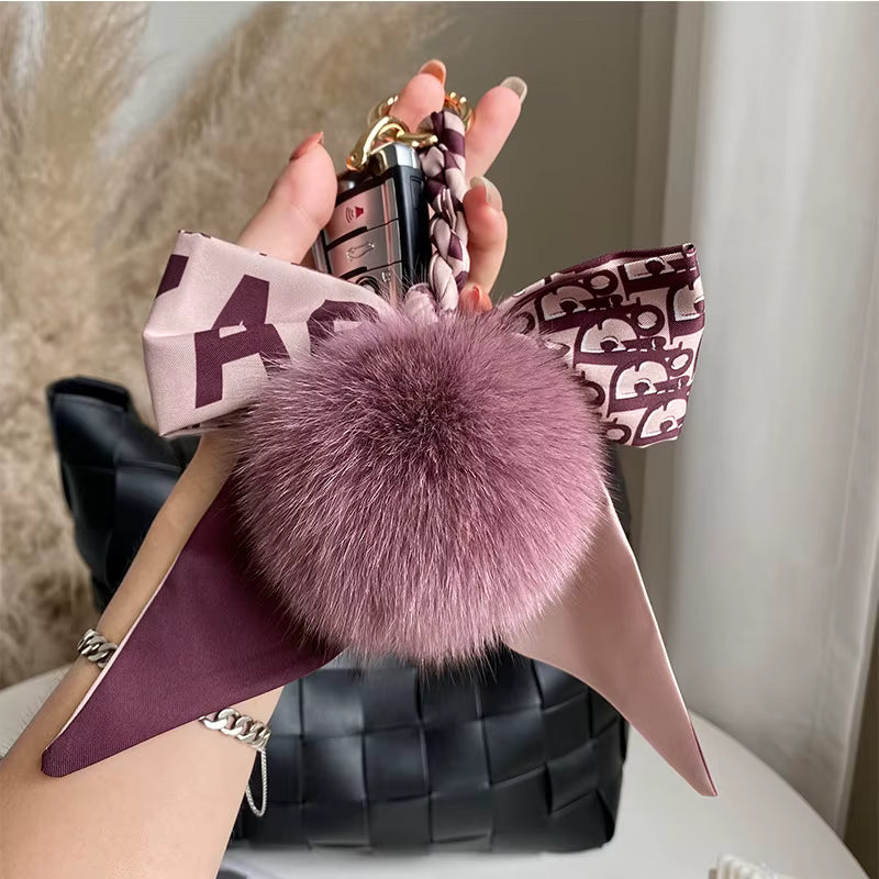 BOWED POMPOM CHARM
