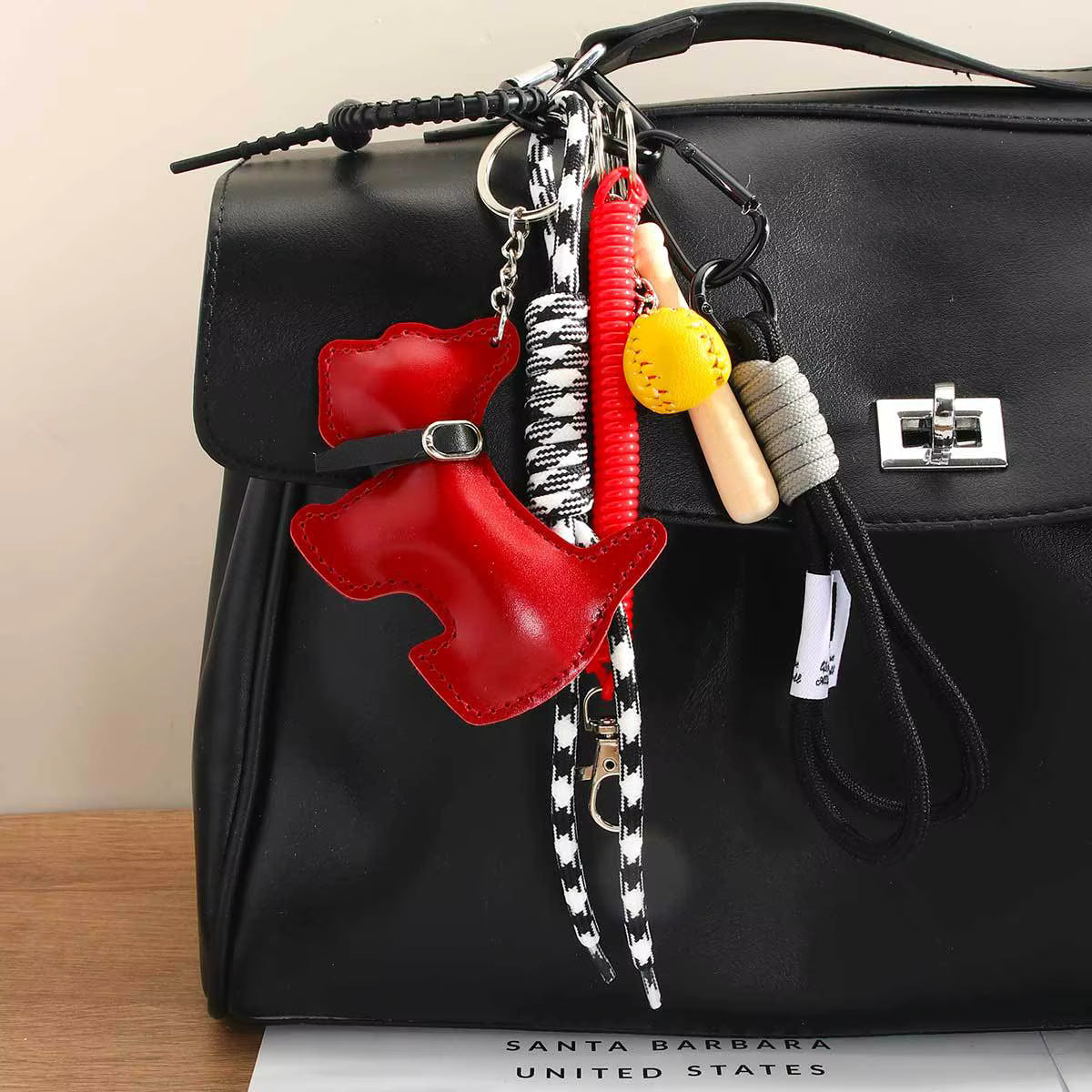 CARTOON DOG SPORTS TASSEL CHARM