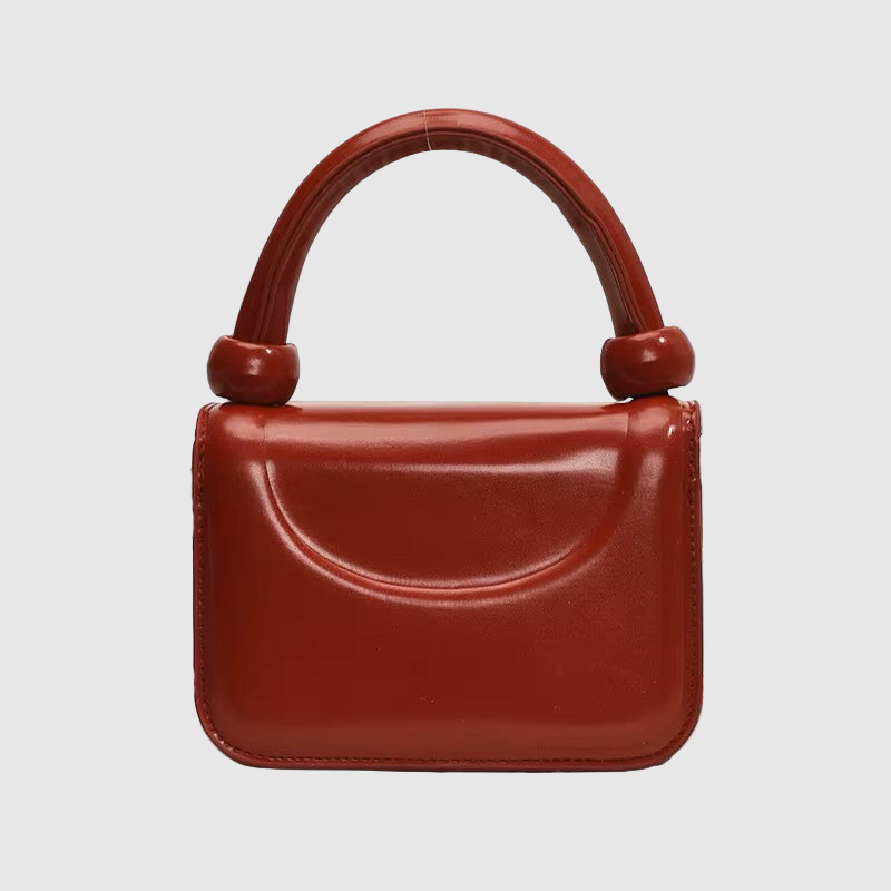THE MONROE CURVED BAG