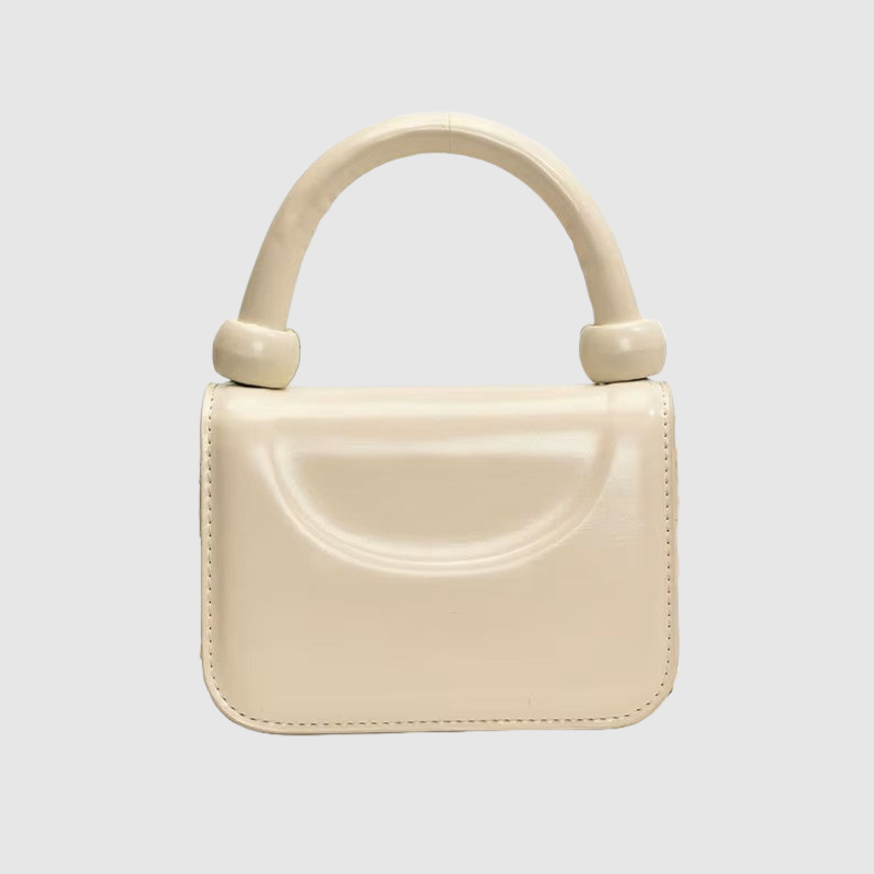 THE MONROE CURVED BAG