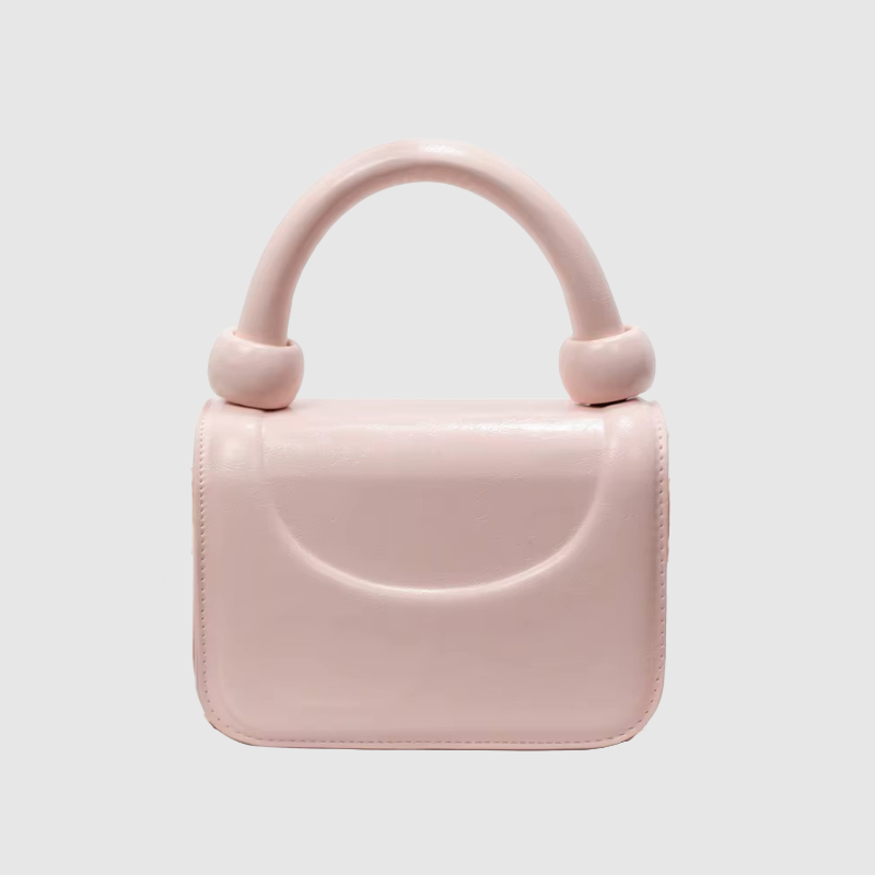 THE MONROE CURVED BAG