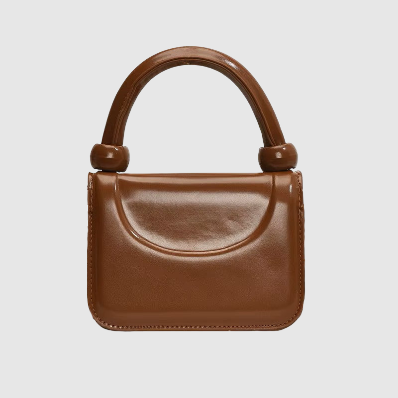 THE MONROE CURVED BAG