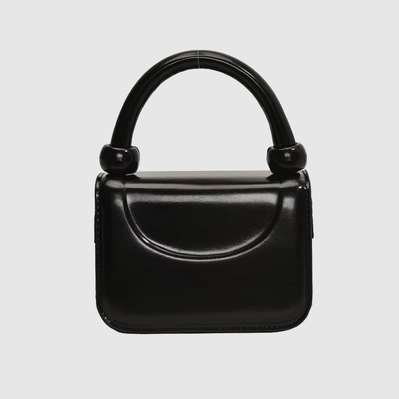THE MONROE CURVED BAG