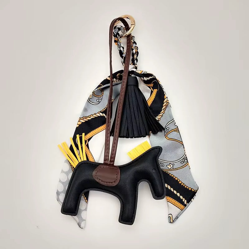 PONY BAG CHARM WITH SCARF AND TASSEL